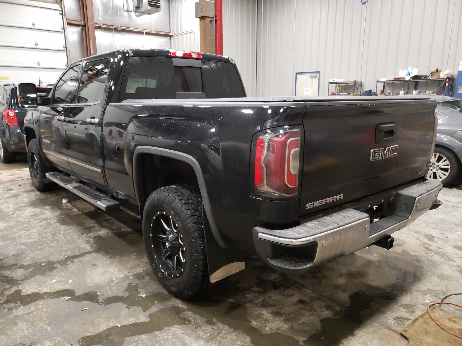 Photo 3 from auction – 2018 GMC SIERRA K15 with VIN 3GTU2NEJ5JG394358