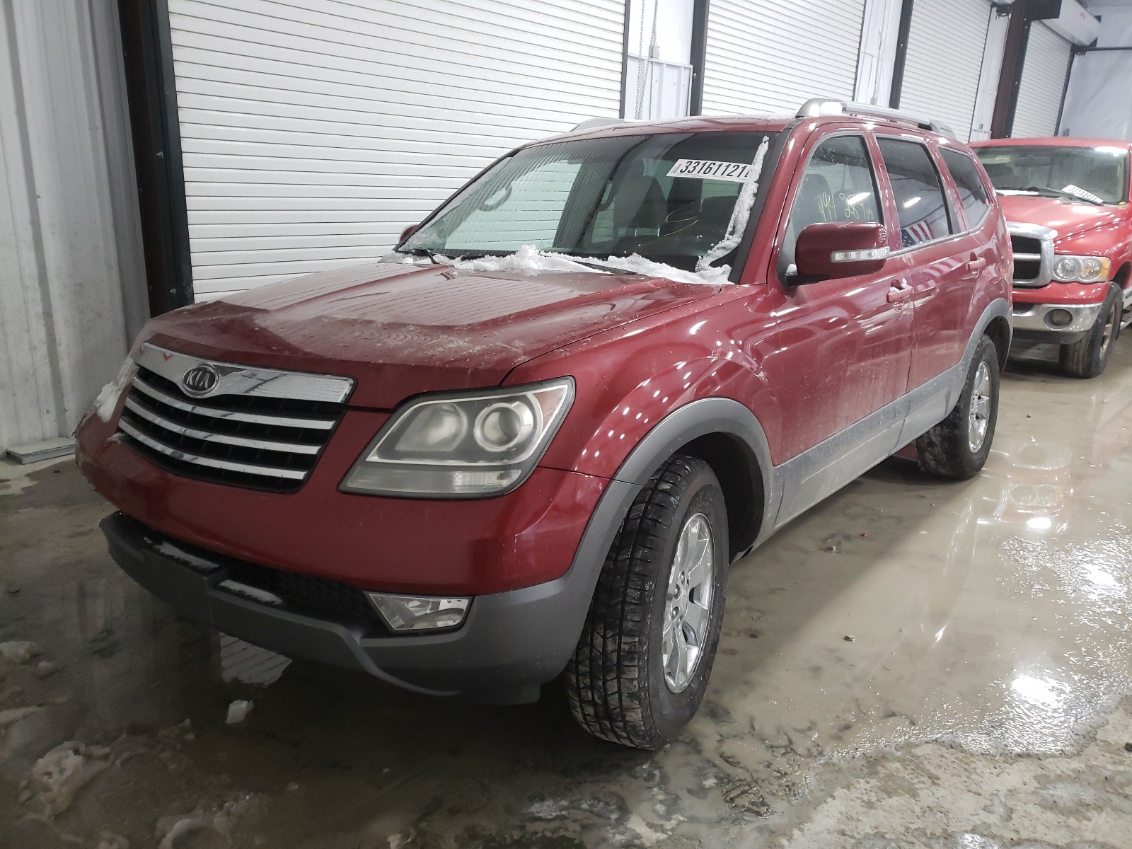 Photo 2 from auction – 2009 KIA BORREGO LX with VIN KNDJH741595039773