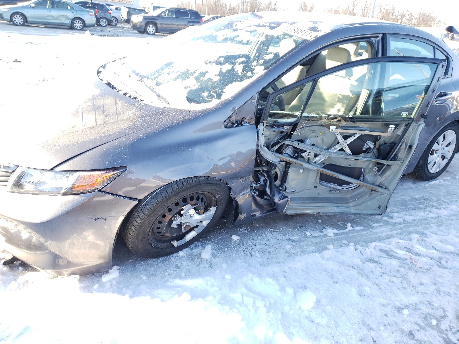 Photo 9 from auction – 2012 HONDA CIVIC LX with VIN 19XFB2F51CE092461