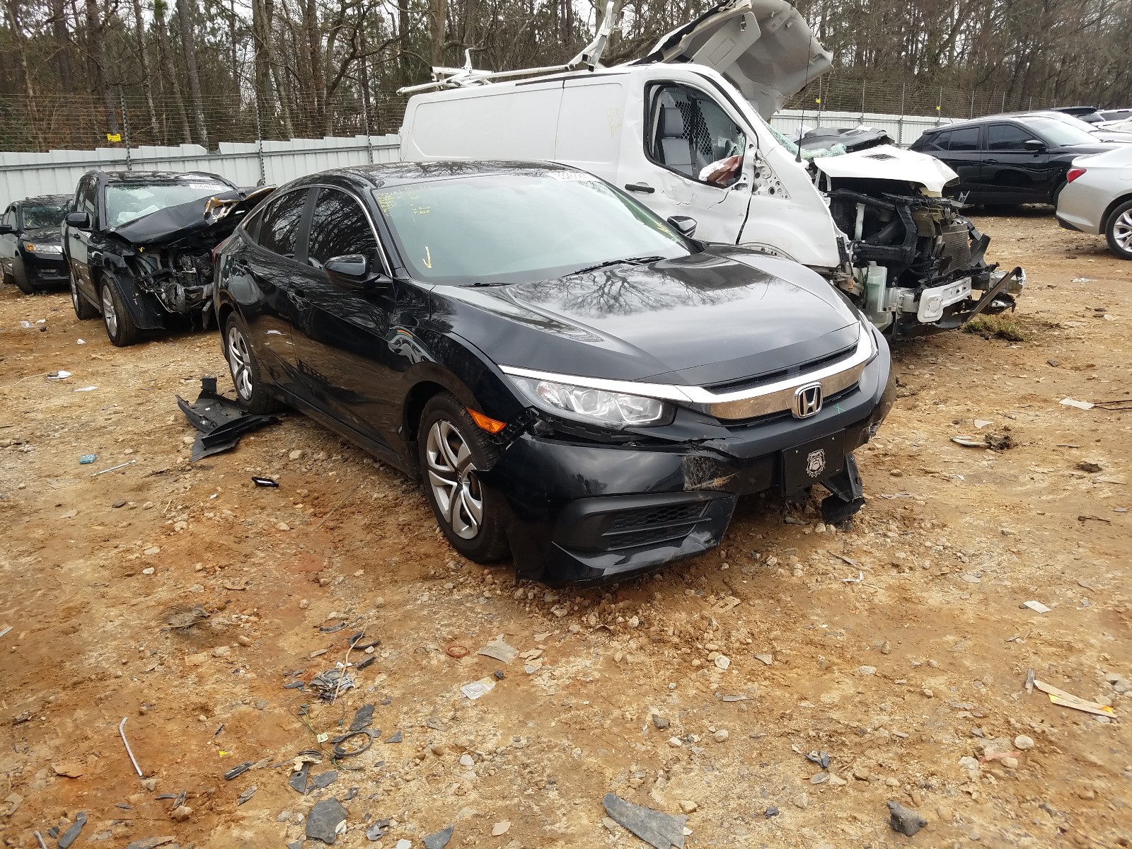 Photo 1 from auction – 2018 HONDA CIVIC LX with VIN 19XFC2F56JE030970