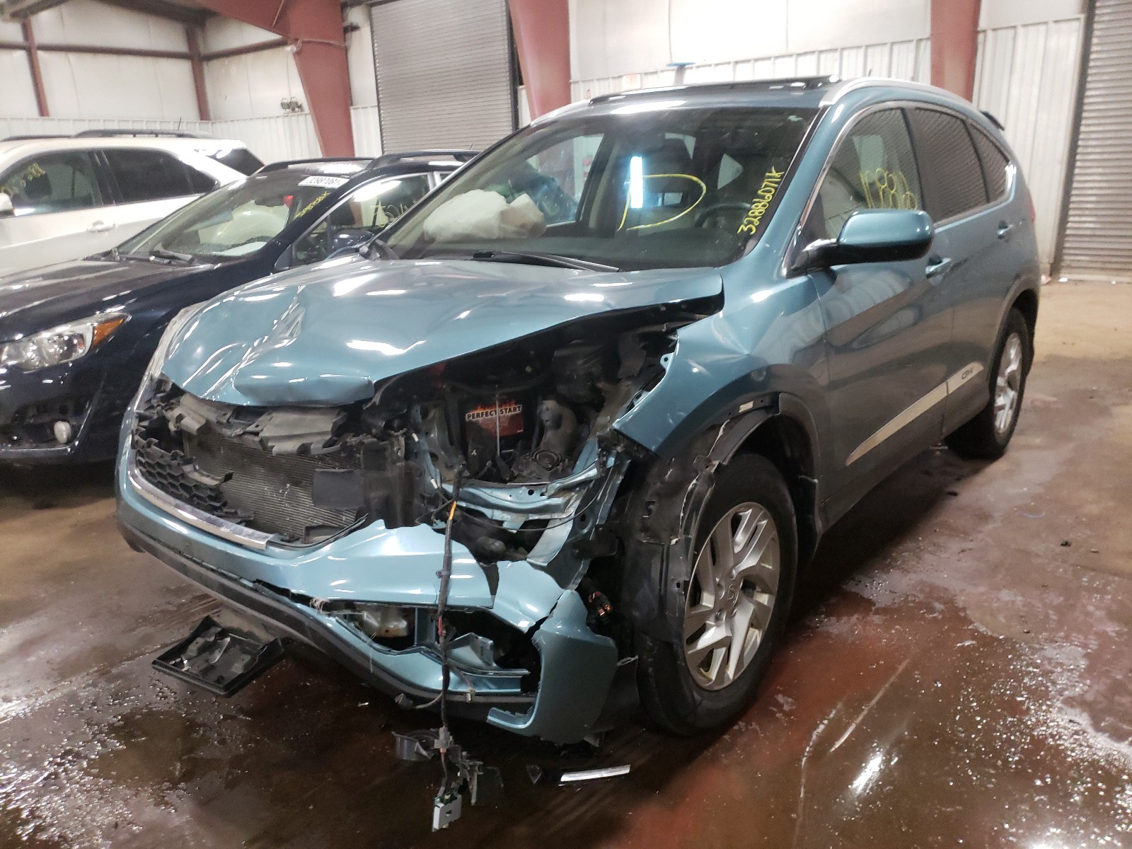 Photo 12 from auction – 2015 HONDA CR-V EXL with VIN 5J6RM4H79FL029261