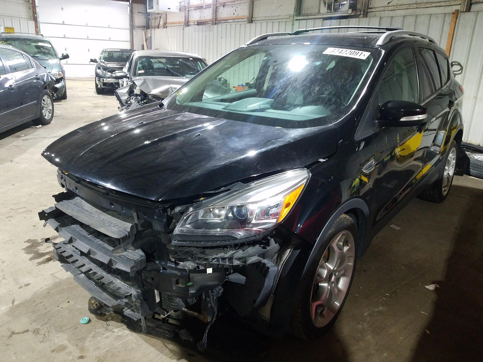 Photo 2 from auction – 2016 FORD ESCAPE TIT with VIN 1FMCU9J99GUA65057