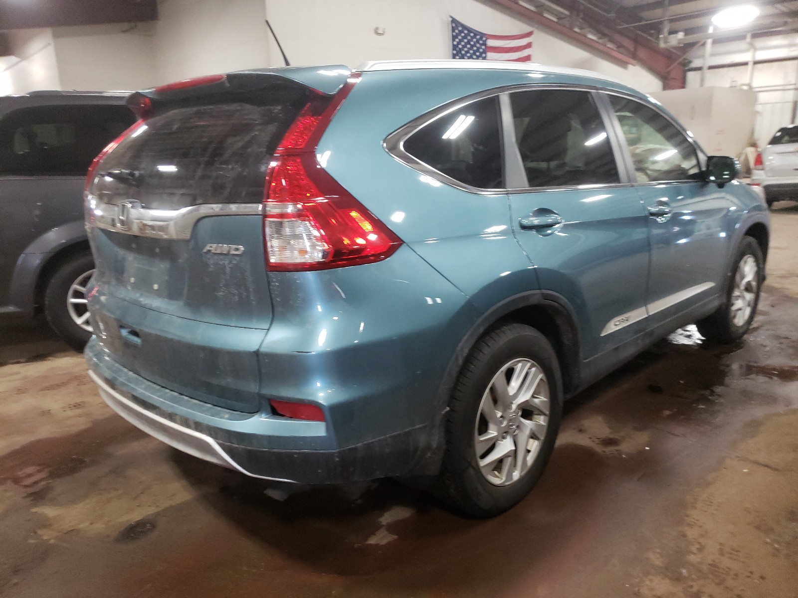 Photo 14 from auction – 2015 HONDA CR-V EXL with VIN 5J6RM4H79FL029261