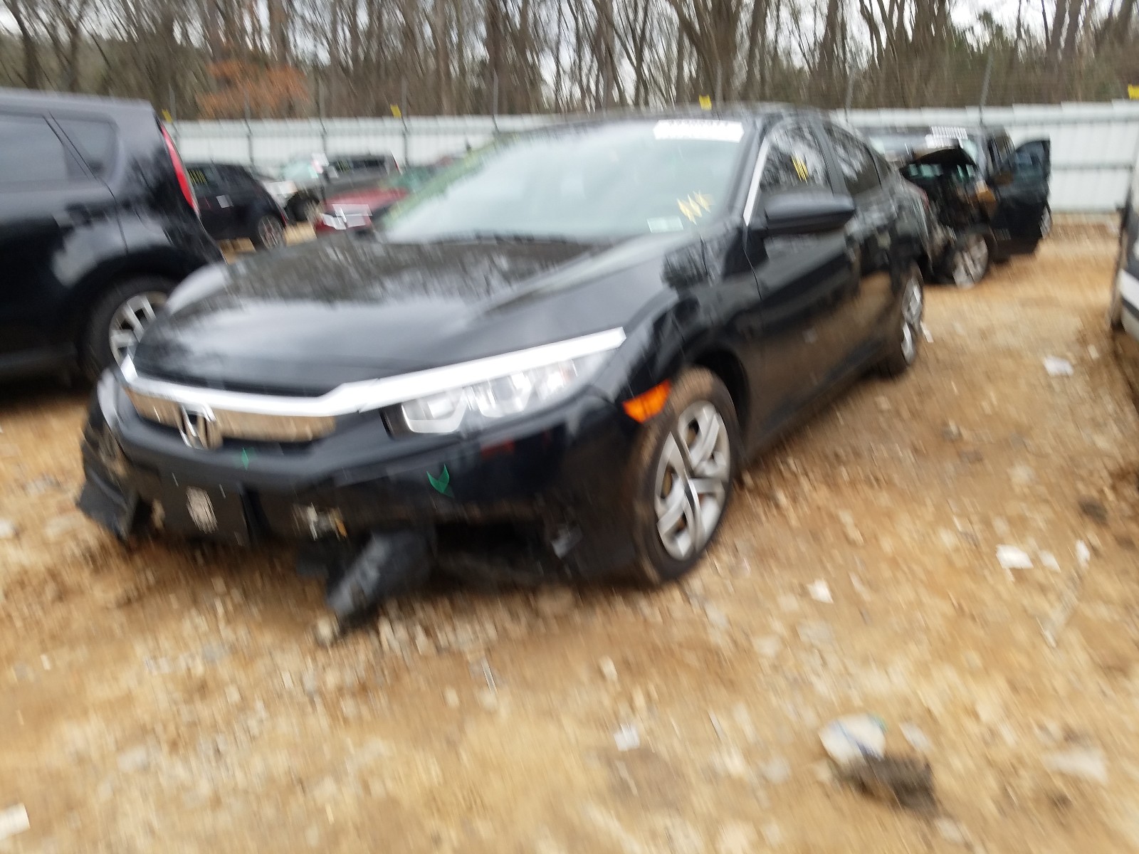 Photo 2 from auction – 2018 HONDA CIVIC LX with VIN 19XFC2F56JE030970