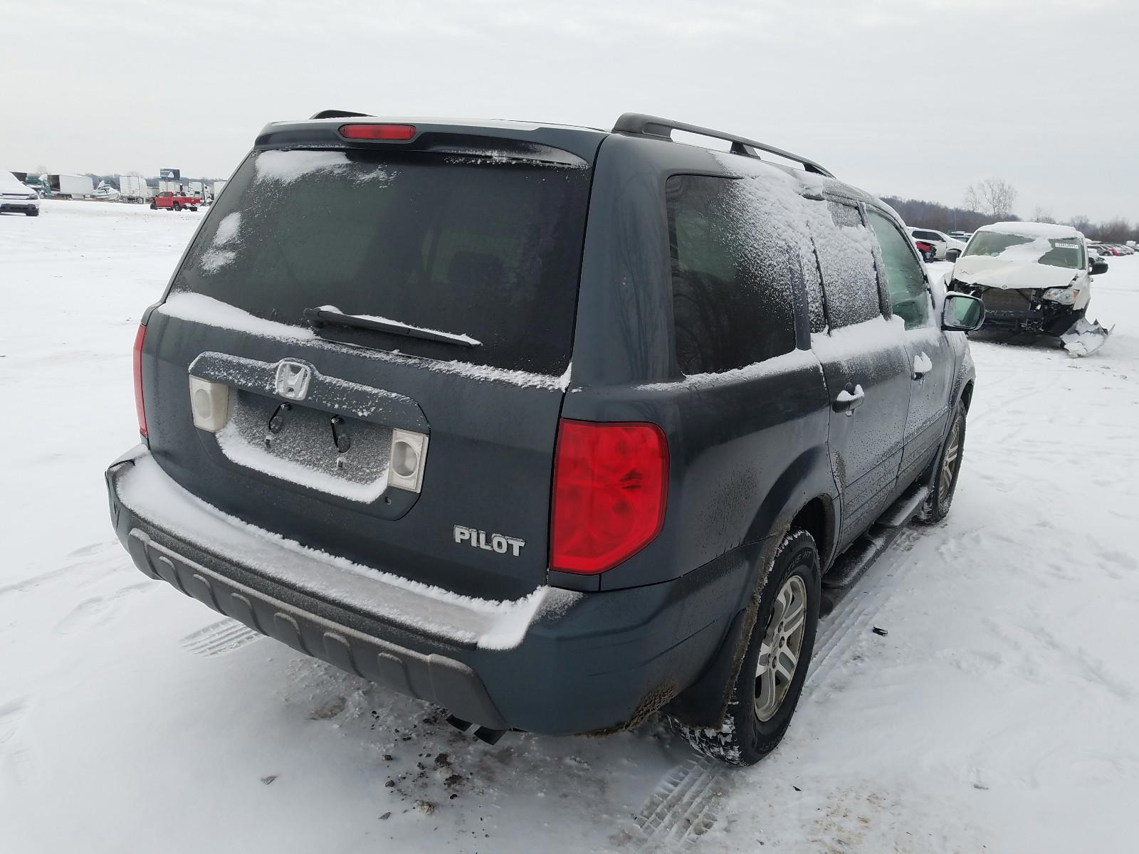 Photo 4 from auction – 2004 HONDA PILOT with VIN 2HKYF18574H599267