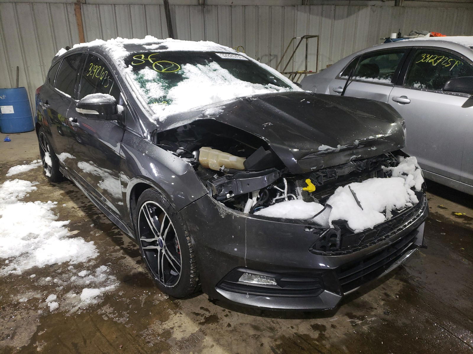 FORD FOCUS ST 2017 with VIN 1FADP3L99HL257070 - Photo from auction