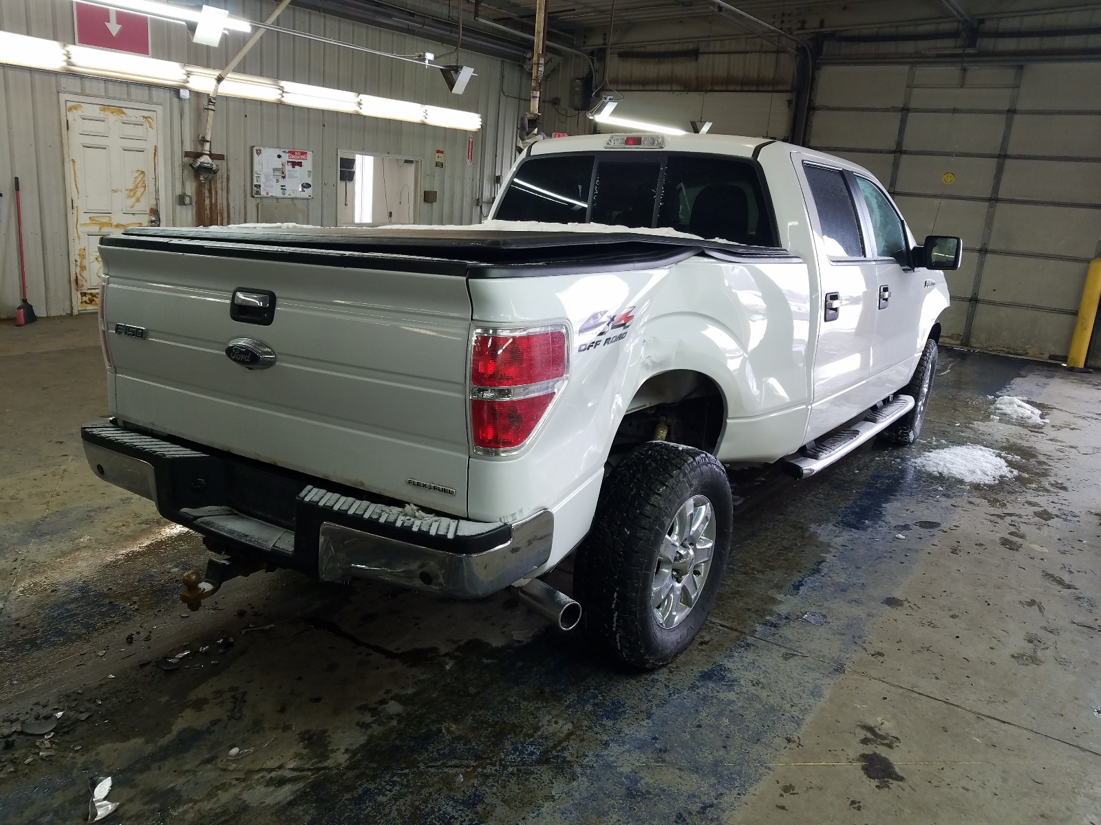 Photo 4 from auction – 2013 FORD F150 SUPER with VIN 1FTFW1EF7DKE30971
