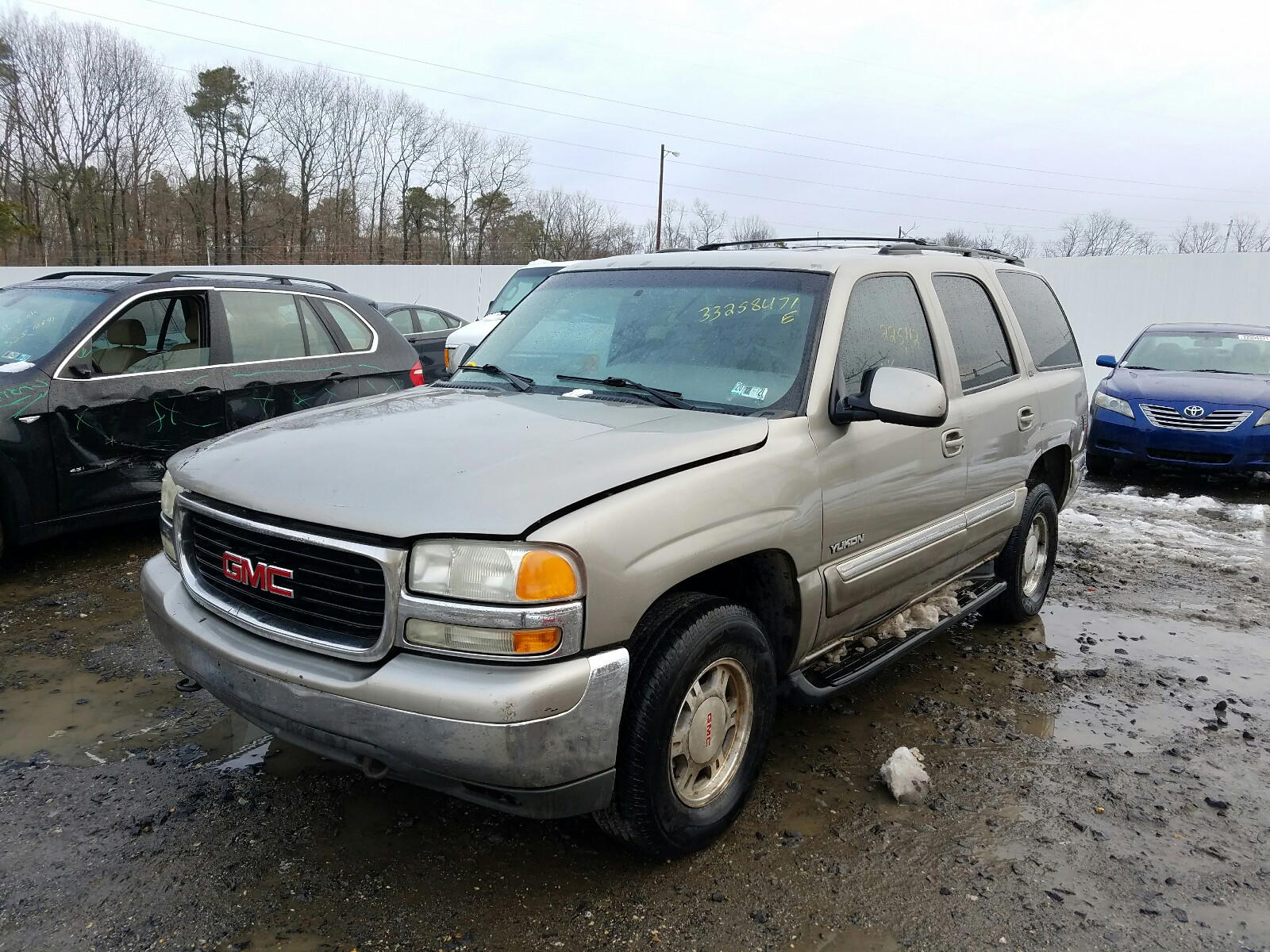 Photo 2 from auction – 2001 GMC YUKON with VIN 1GKEK13V21J213853