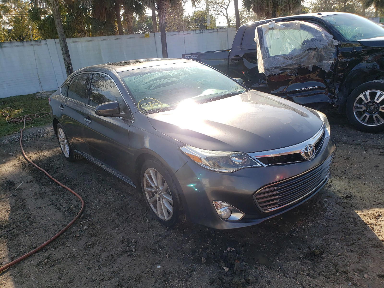 TOYOTA AVALON BAS 2014 with VIN 4T1BK1EB3EU098973 - Photo from auction