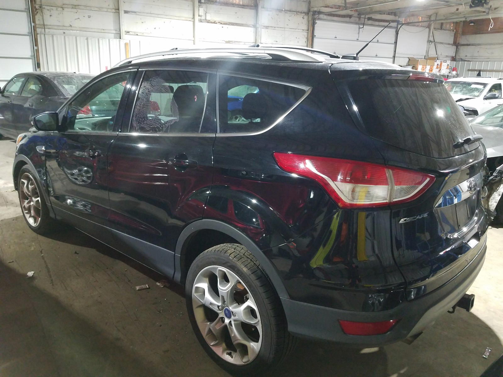 Photo 3 from auction – 2016 FORD ESCAPE TIT with VIN 1FMCU9J99GUA65057