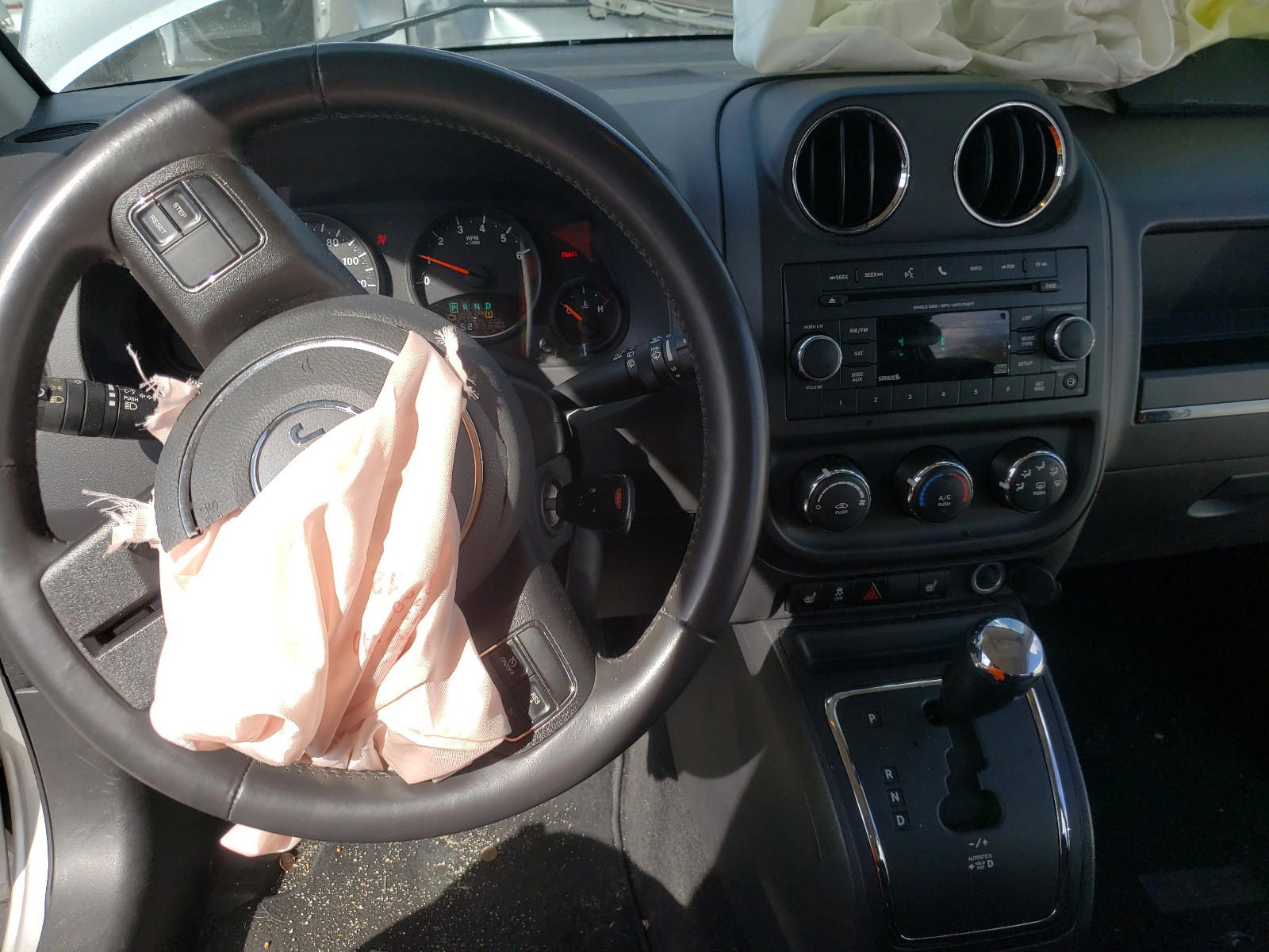 Photo 9 from auction – 2013 JEEP COMPASS LA with VIN 1C4NJDEB2DD129120