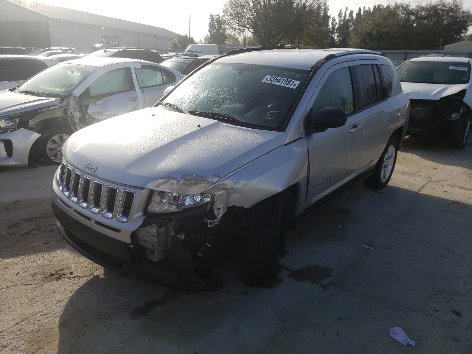 Photo 2 from auction – 2013 JEEP COMPASS LA with VIN 1C4NJDEB2DD129120