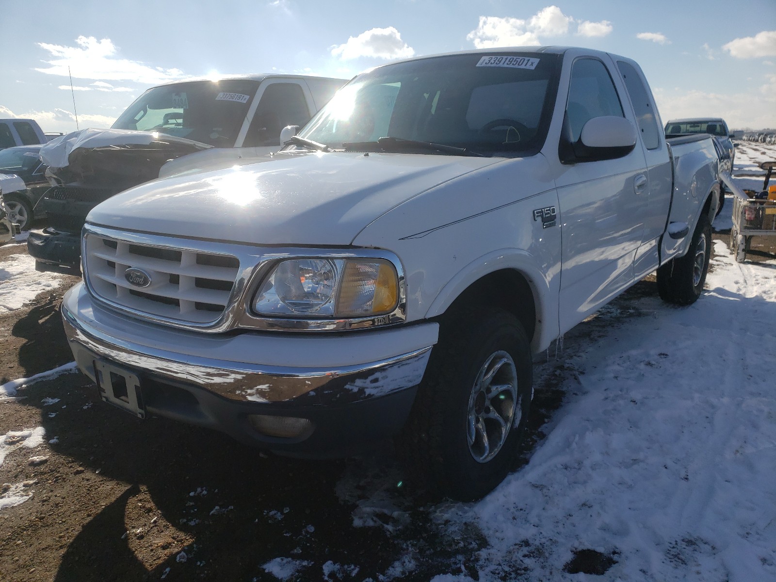 Zdjęcie 2 z aukcji – 1999 FORD F150 z VIN 2FTRX08L5XCA31524