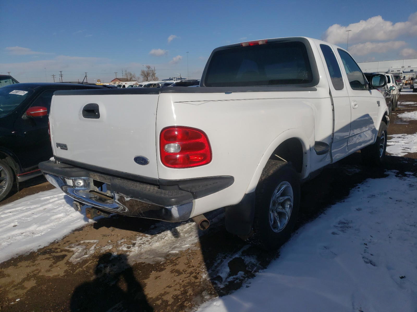 Photo 4 from auction – 1999 FORD F150 with VIN 2FTRX08L5XCA31524