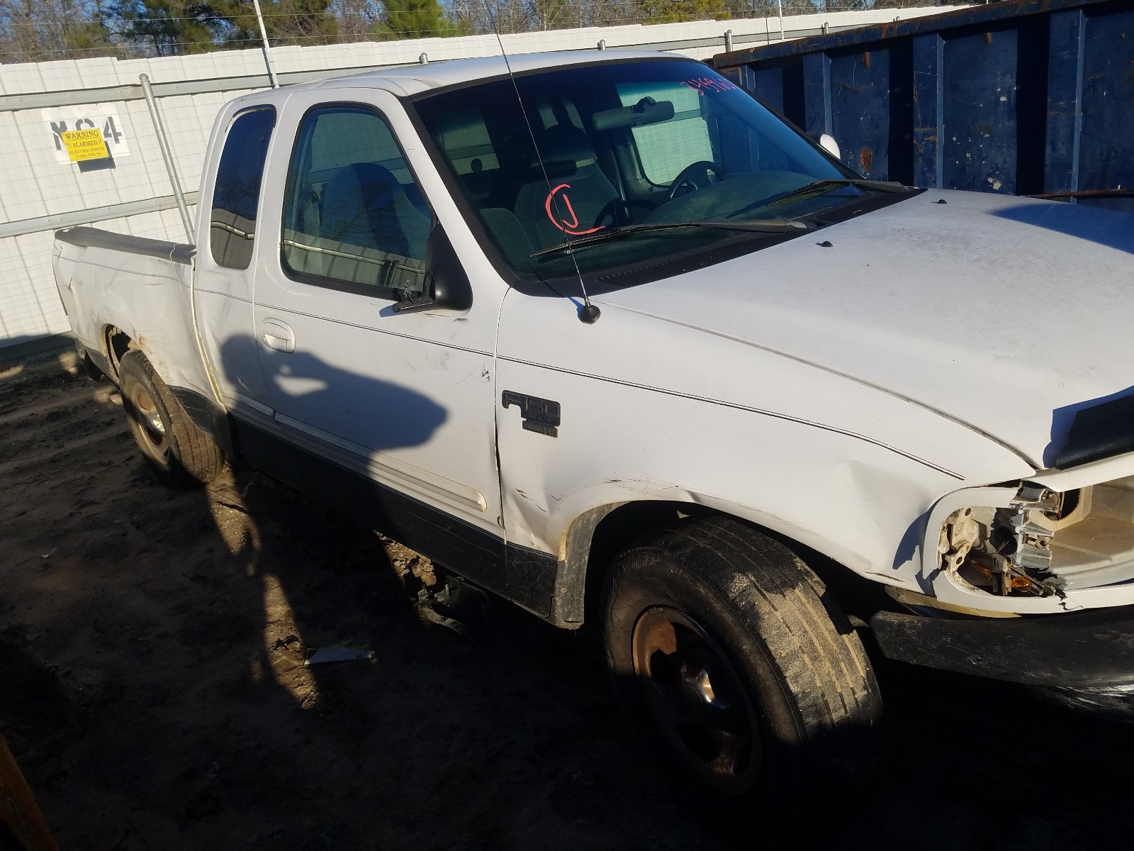 Photo 9 from auction – 1999 FORD F150 with VIN 1FTRX17W9XNB77839