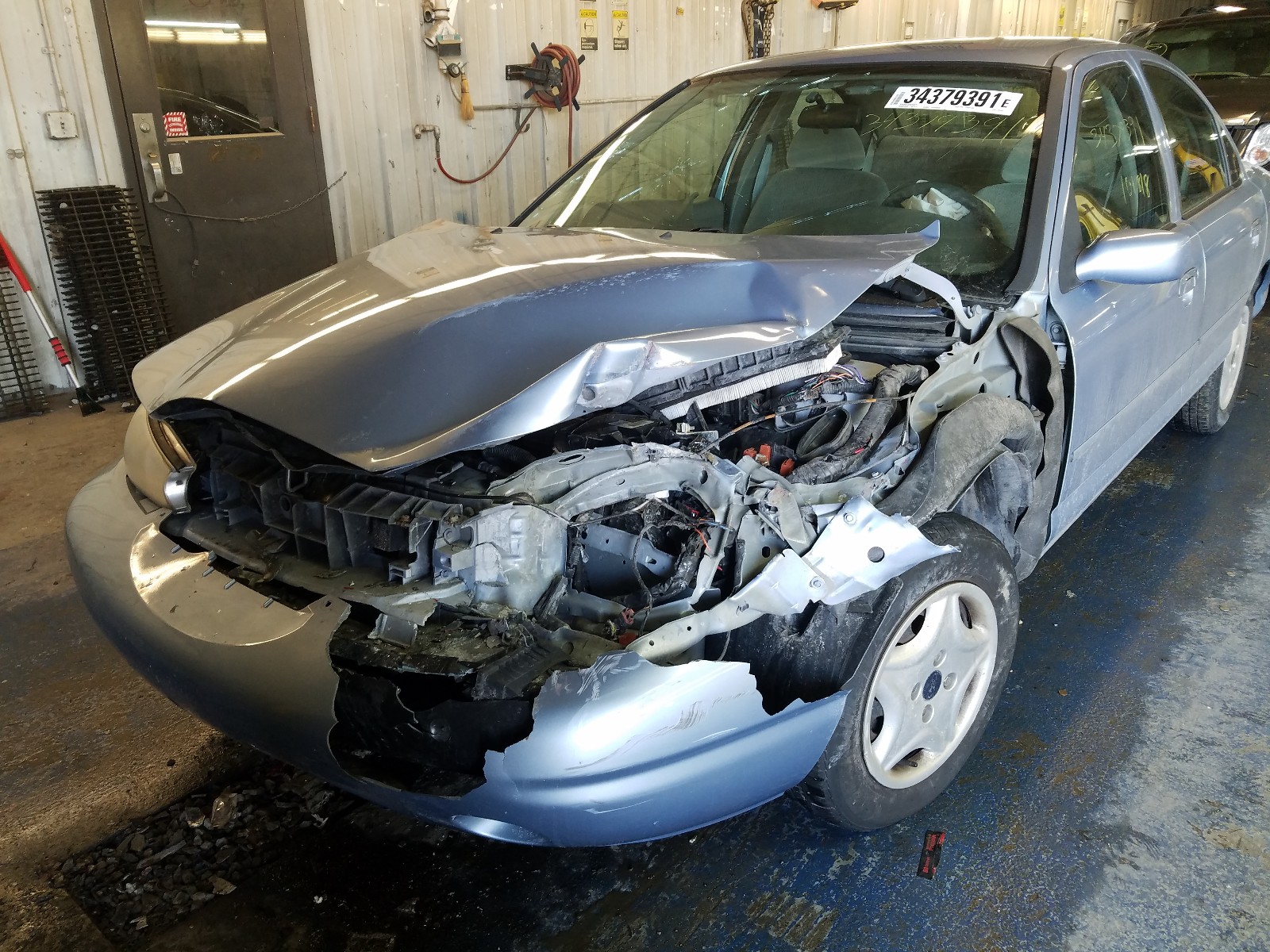Photo 9 from auction – 1998 FORD CONTOUR LX with VIN 1FAFP6631WK301809