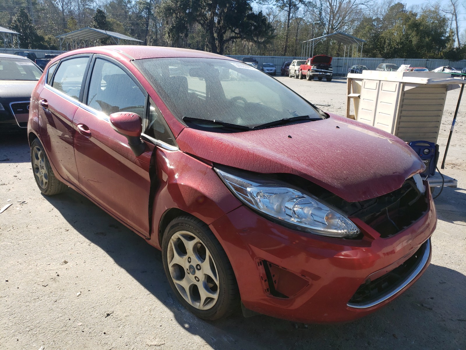 FORD FIESTA SES 2011 with VIN 3FADP4FJ3BM165809 - Photo from auction