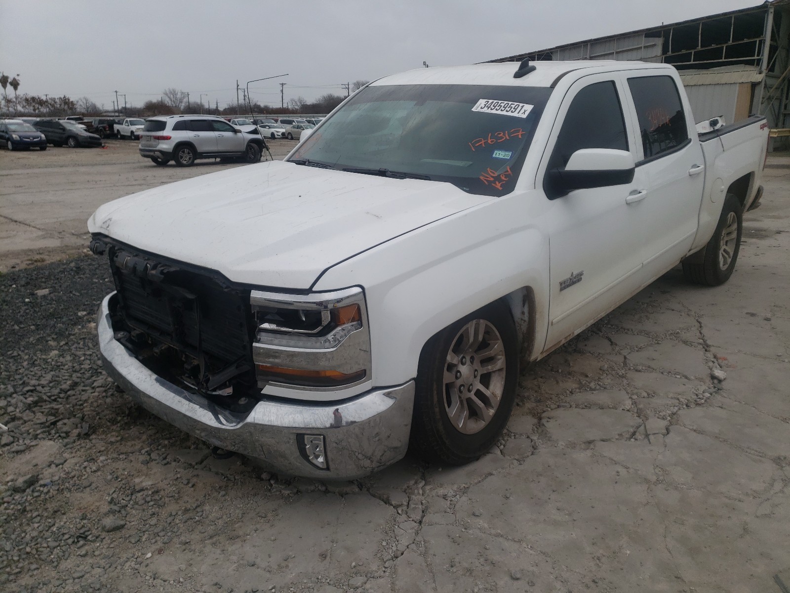 Photo 2 from auction – 2018 CHEVROLET SILVERADO with VIN 3GCUKREC7JG176317