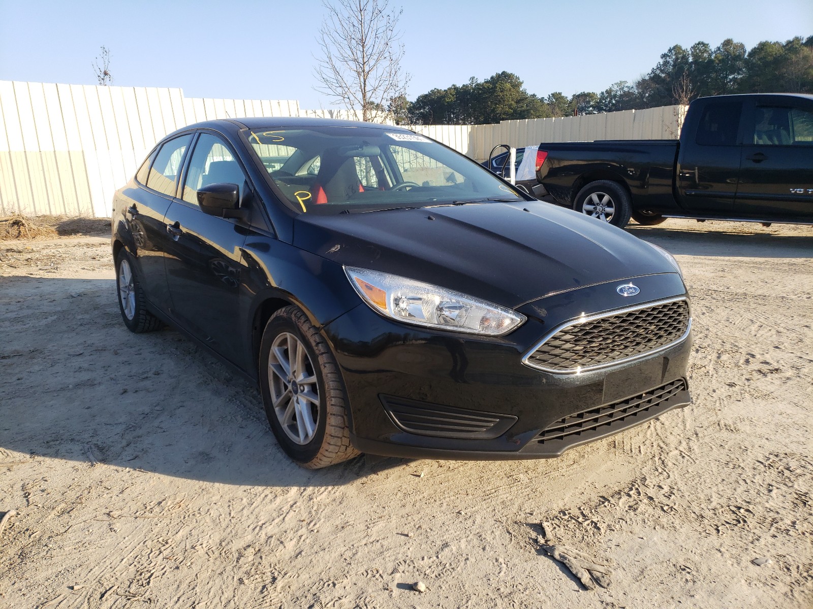 FORD FOCUS SE 2018 with VIN 1FADP3F21JL316150 - Photo from auction