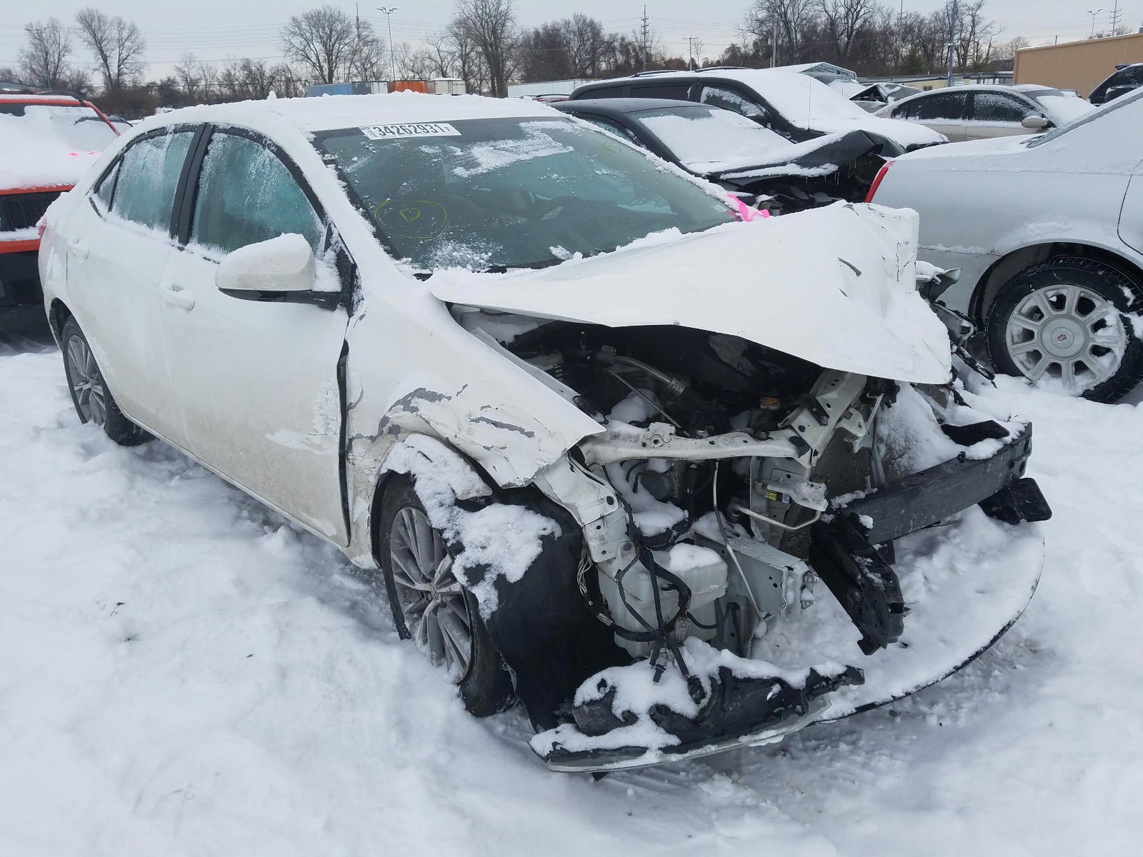 TOYOTA COROLLA L 2015 with VIN 5YFBURHE0FP214423 - Photo from auction