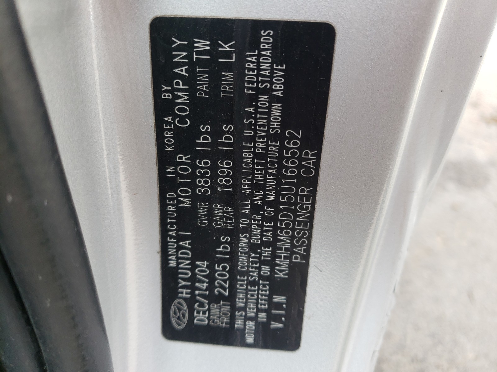 Photo 10 from auction – 2005 HYUNDAI TIBURON with VIN KMHHM65D15U166562