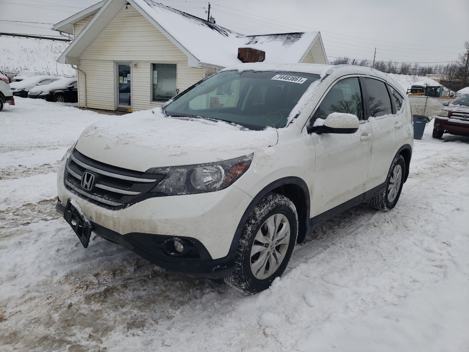 Photo 2 from auction – 2014 HONDA CR-V EXL with VIN 5J6RM4H72EL019038