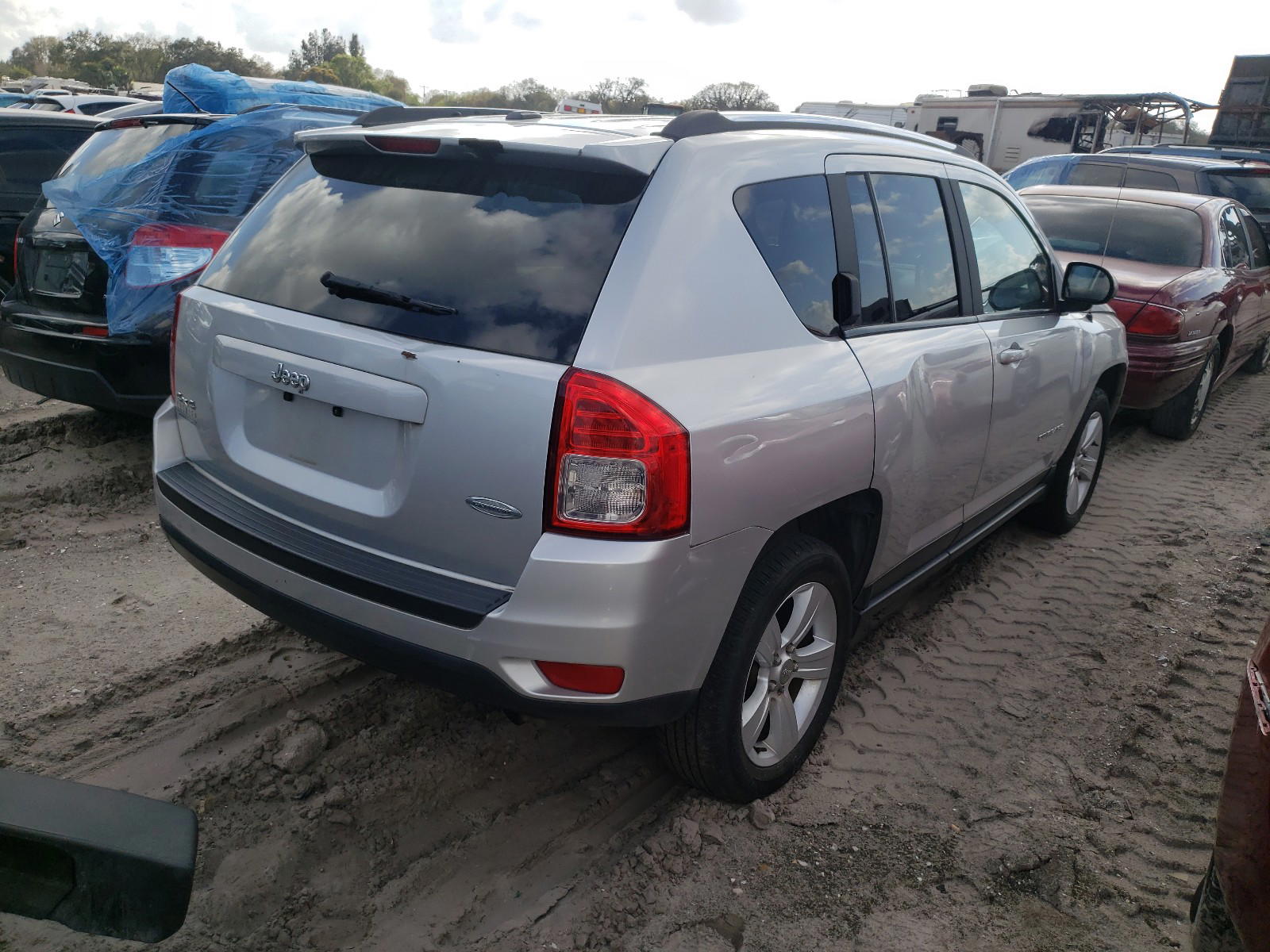 Photo 4 from auction – 2013 JEEP COMPASS LA with VIN 1C4NJDEB2DD129120