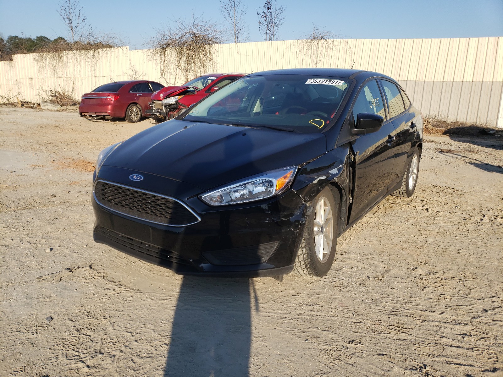 Photo 2 from auction – 2018 FORD FOCUS SE with VIN 1FADP3F21JL316150