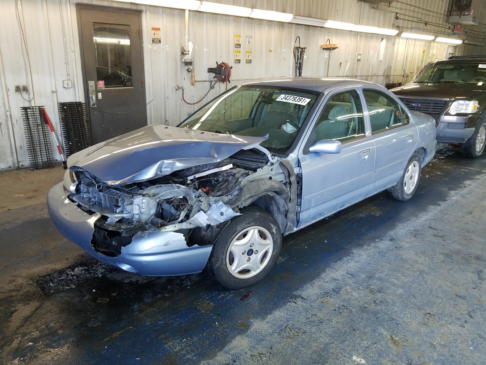 Photo 2 from auction – 1998 FORD CONTOUR LX with VIN 1FAFP6631WK301809