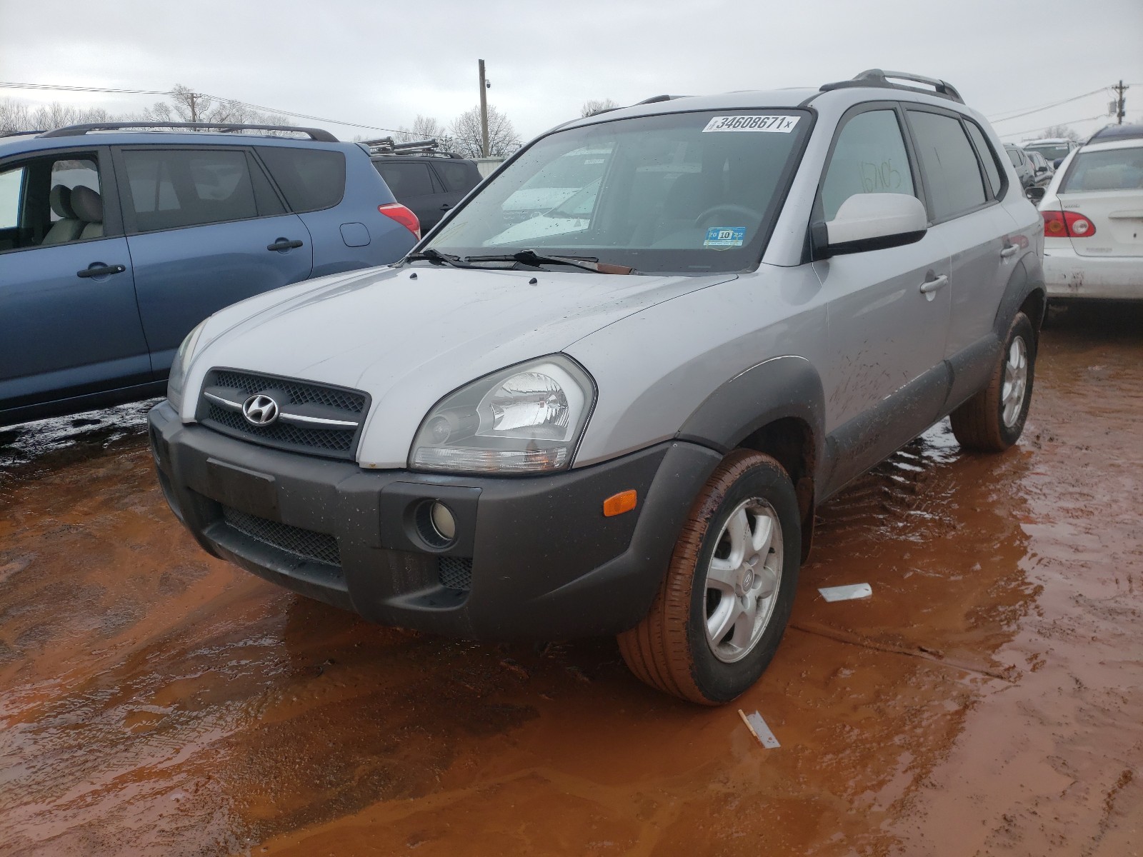 Photo 2 from auction – 2005 HYUNDAI TUCSON with VIN KM8JN72D55U043470