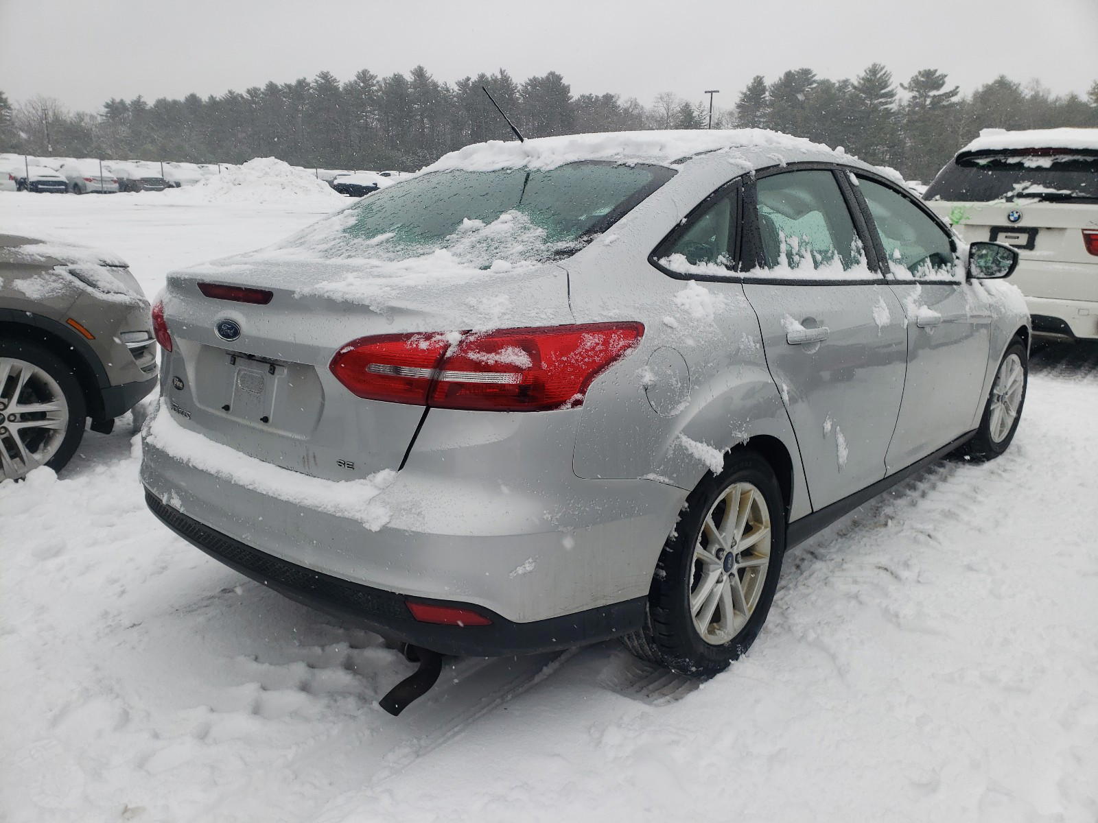 Photo 4 from auction – 2016 FORD FOCUS SE with VIN 1FADP3F21GL210418