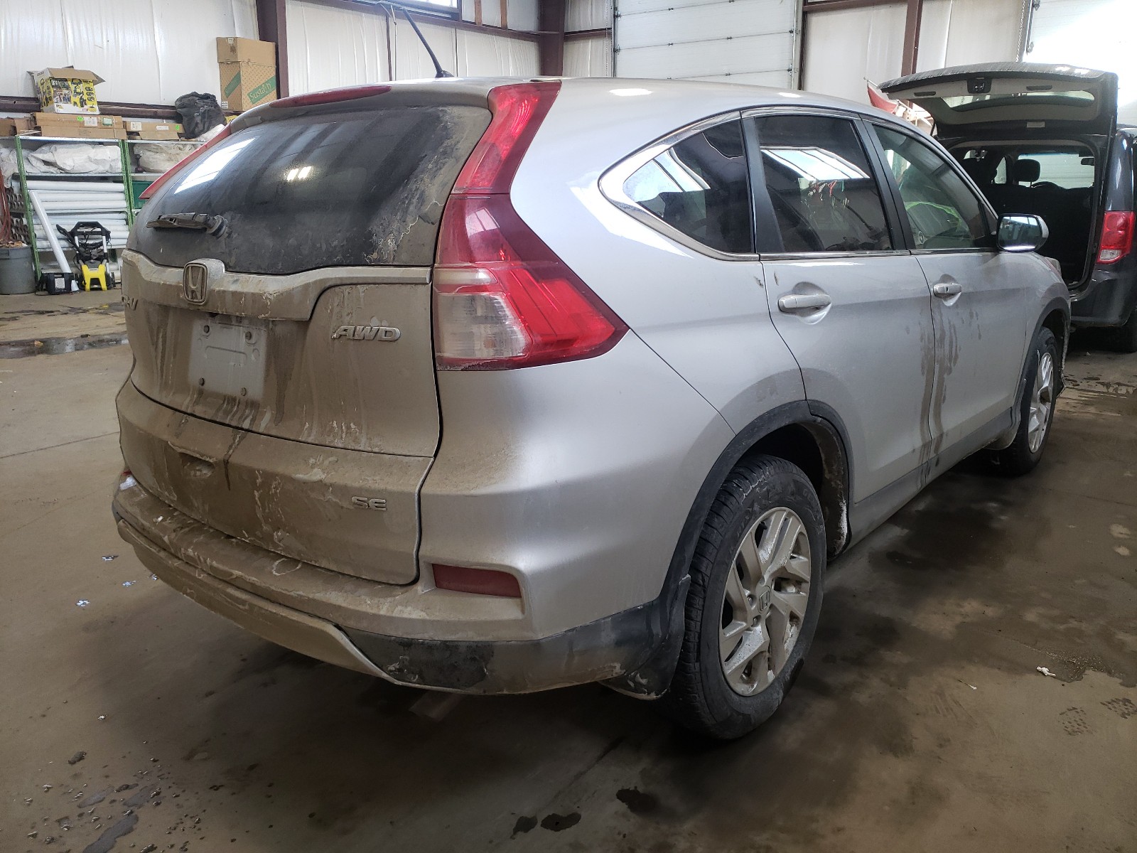 Photo 4 from auction – 2016 HONDA CR-V SE with VIN 2HKRM4H41GH112636