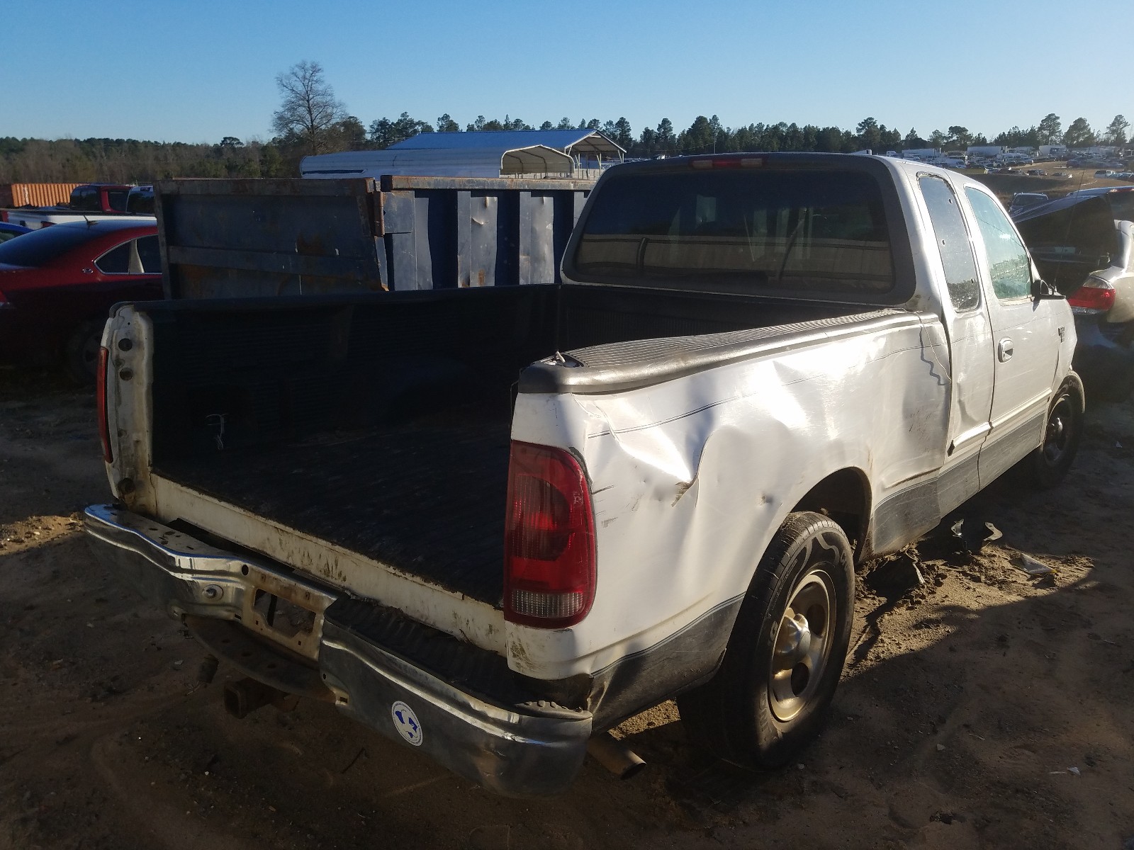Photo 4 from auction – 1999 FORD F150 with VIN 1FTRX17W9XNB77839