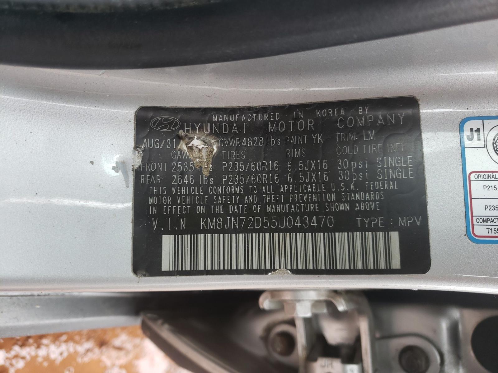 Photo 10 from auction – 2005 HYUNDAI TUCSON with VIN KM8JN72D55U043470
