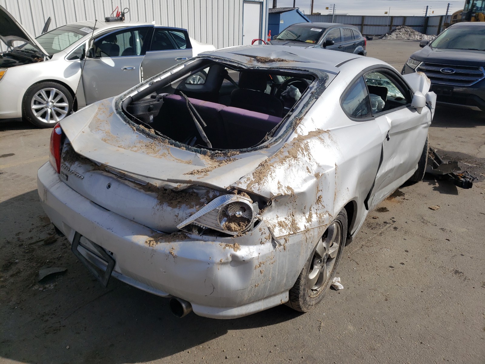 Photo 4 from auction – 2005 HYUNDAI TIBURON with VIN KMHHM65D15U166562