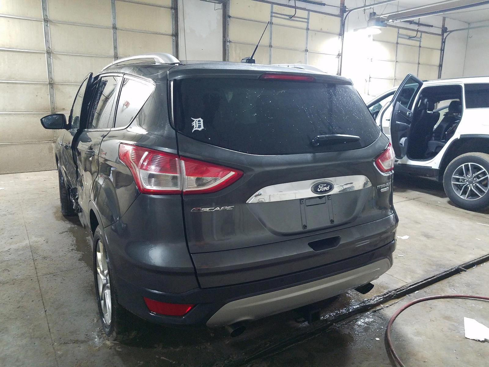 Photo 3 from auction – 2016 FORD ESCAPE TIT with VIN 1FMCU9JX5GUA96823