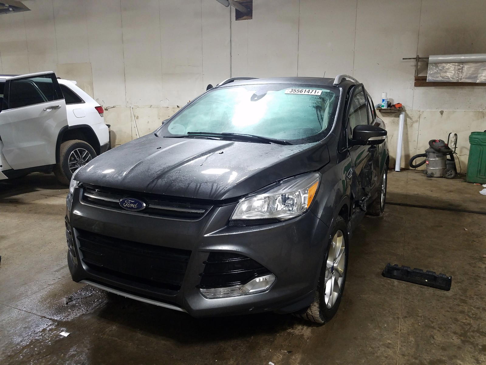 Photo 2 from auction – 2016 FORD ESCAPE TIT with VIN 1FMCU9JX5GUA96823