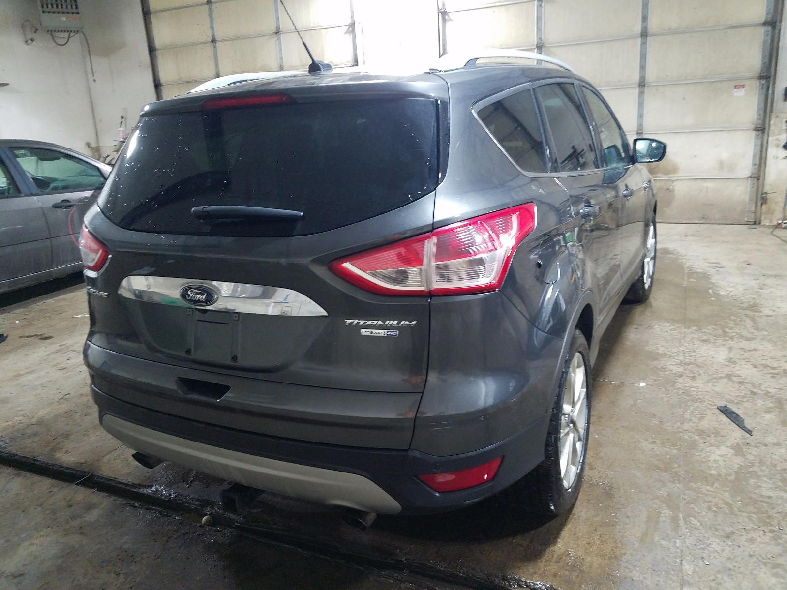 Photo 4 from auction – 2016 FORD ESCAPE TIT with VIN 1FMCU9JX5GUA96823