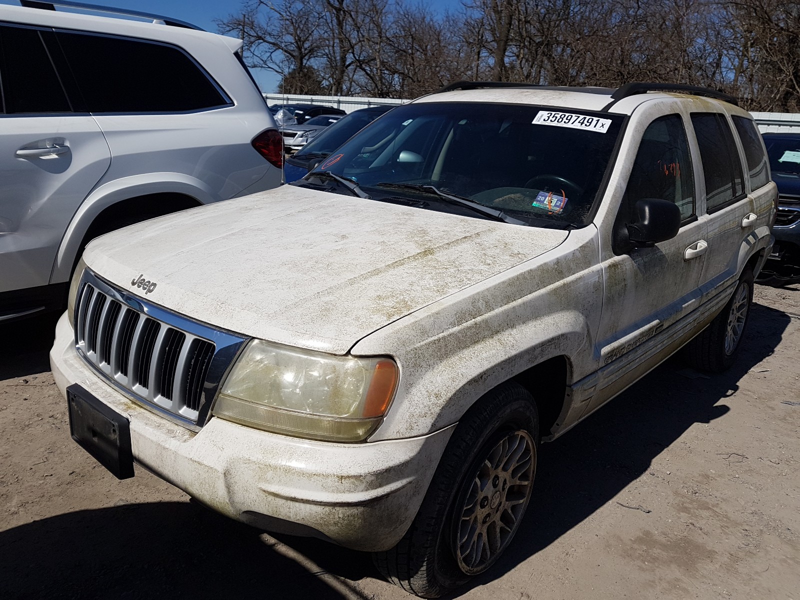 Photo 2 from auction – 2004 JEEP GRAND CHER with VIN 1J8GW58N14C103192