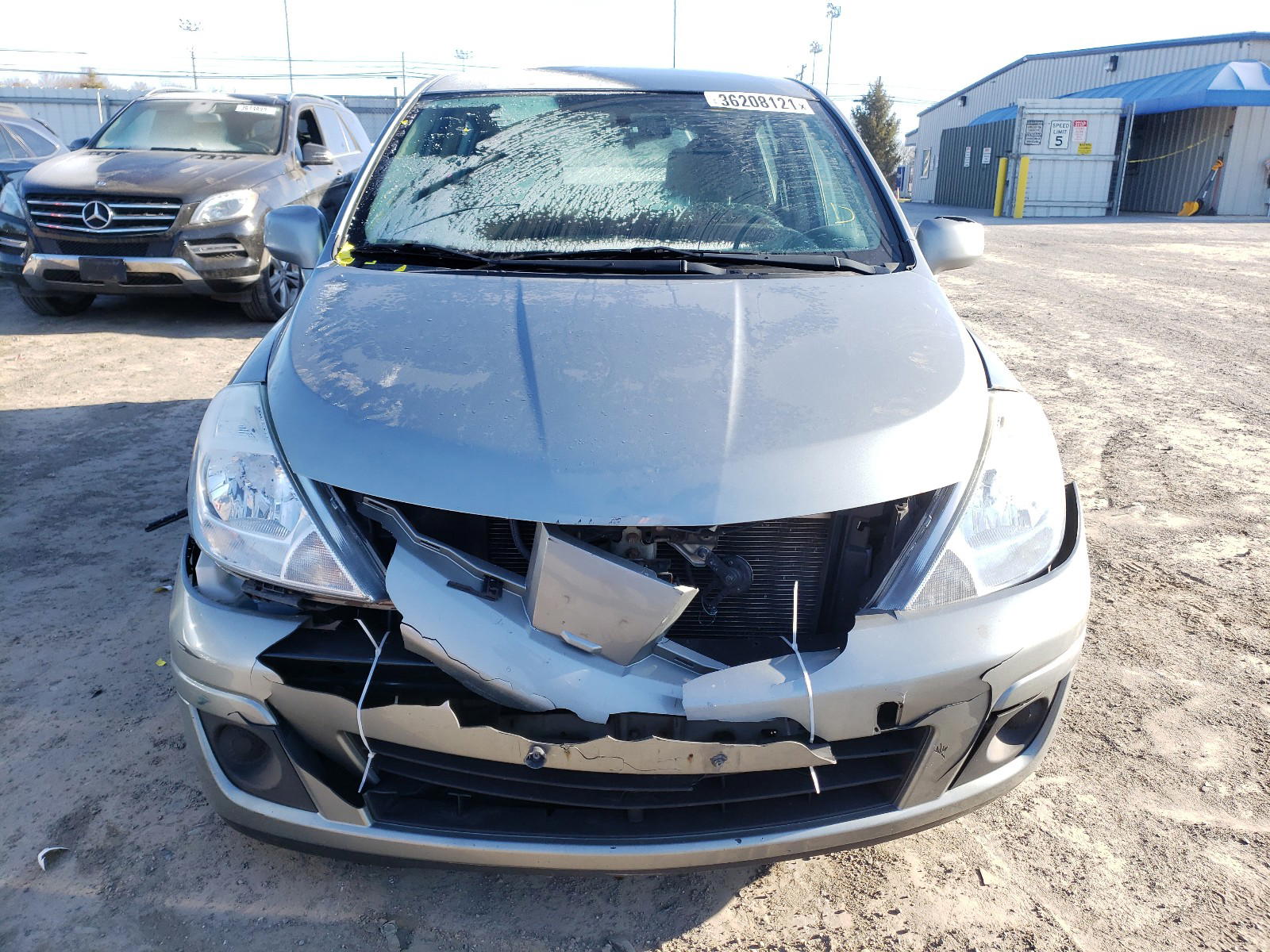 Photo 9 from auction – 2011 NISSAN VERSA S with VIN 3N1BC1CP9BL502268
