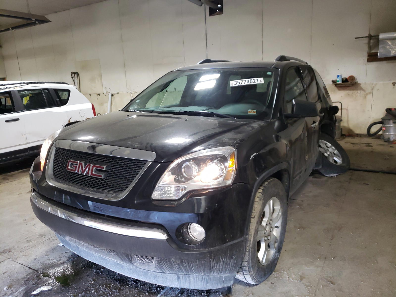 Photo 2 from auction – 2012 GMC ACADIA SLE with VIN 1GKKVNED9CJ420734