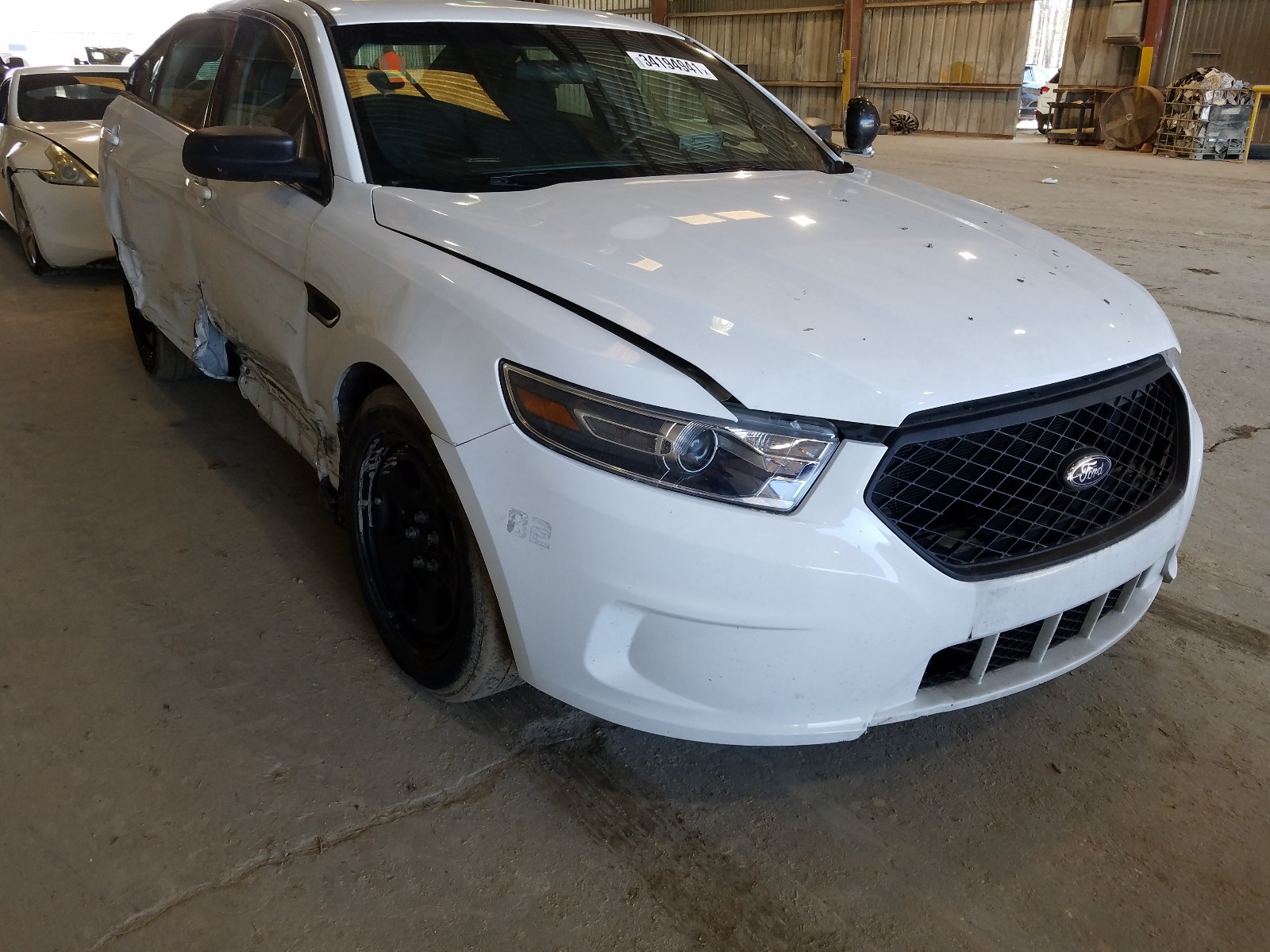 FORD TAURUS POL 2019 with VIN 1FAHP2MK9KG106419 - Photo from auction