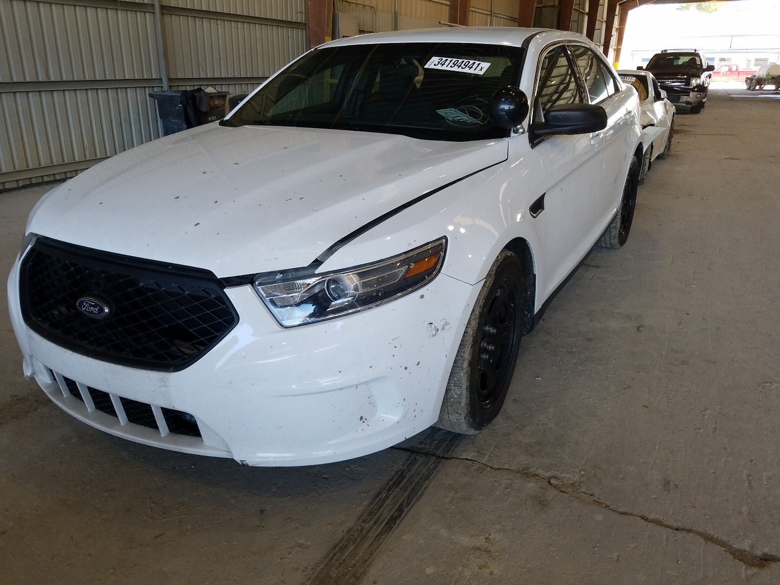 Photo 2 from auction – 2019 FORD TAURUS POL with VIN 1FAHP2MK9KG106419