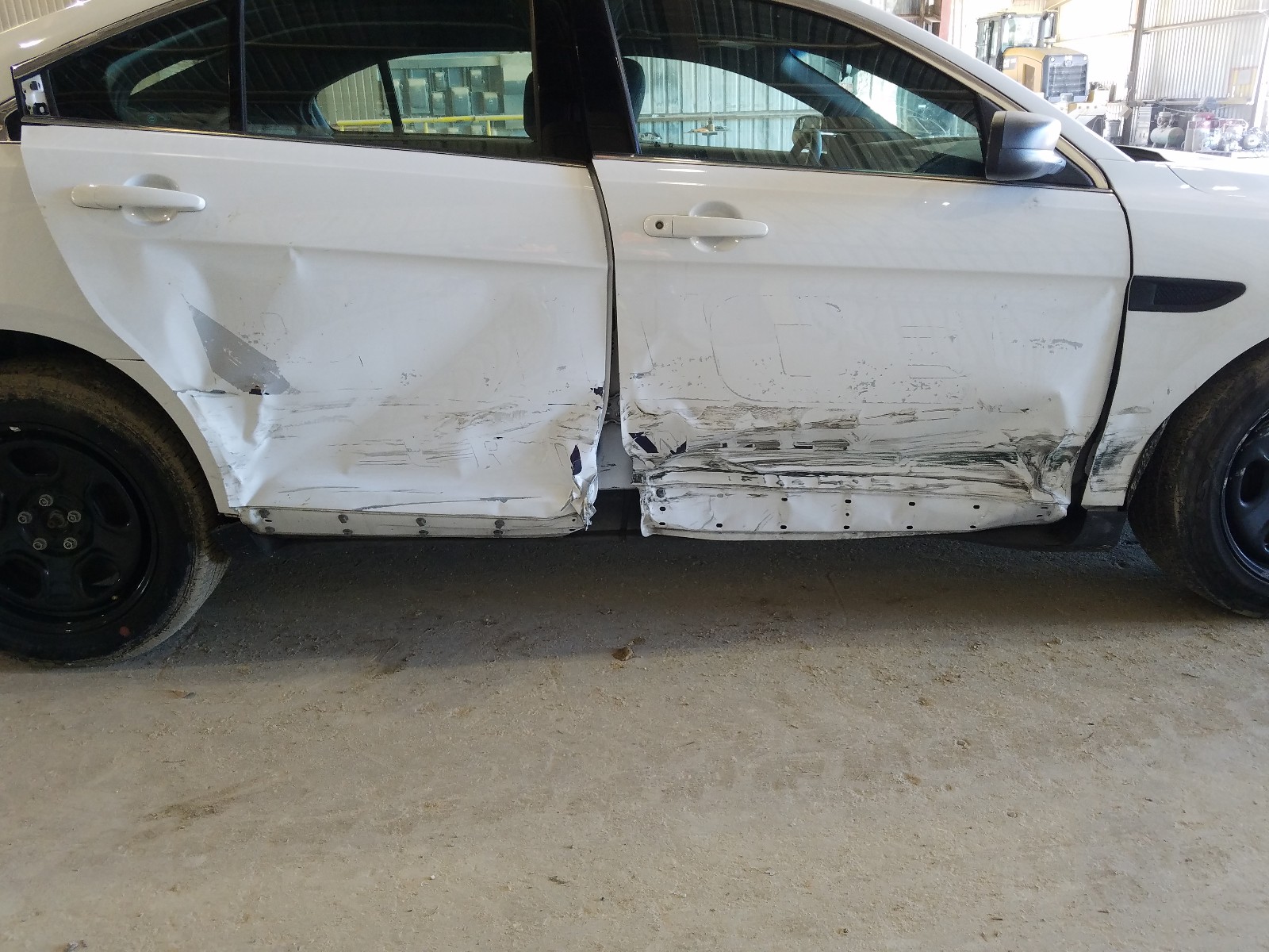 Photo 9 from auction – 2019 FORD TAURUS POL with VIN 1FAHP2MK9KG106419