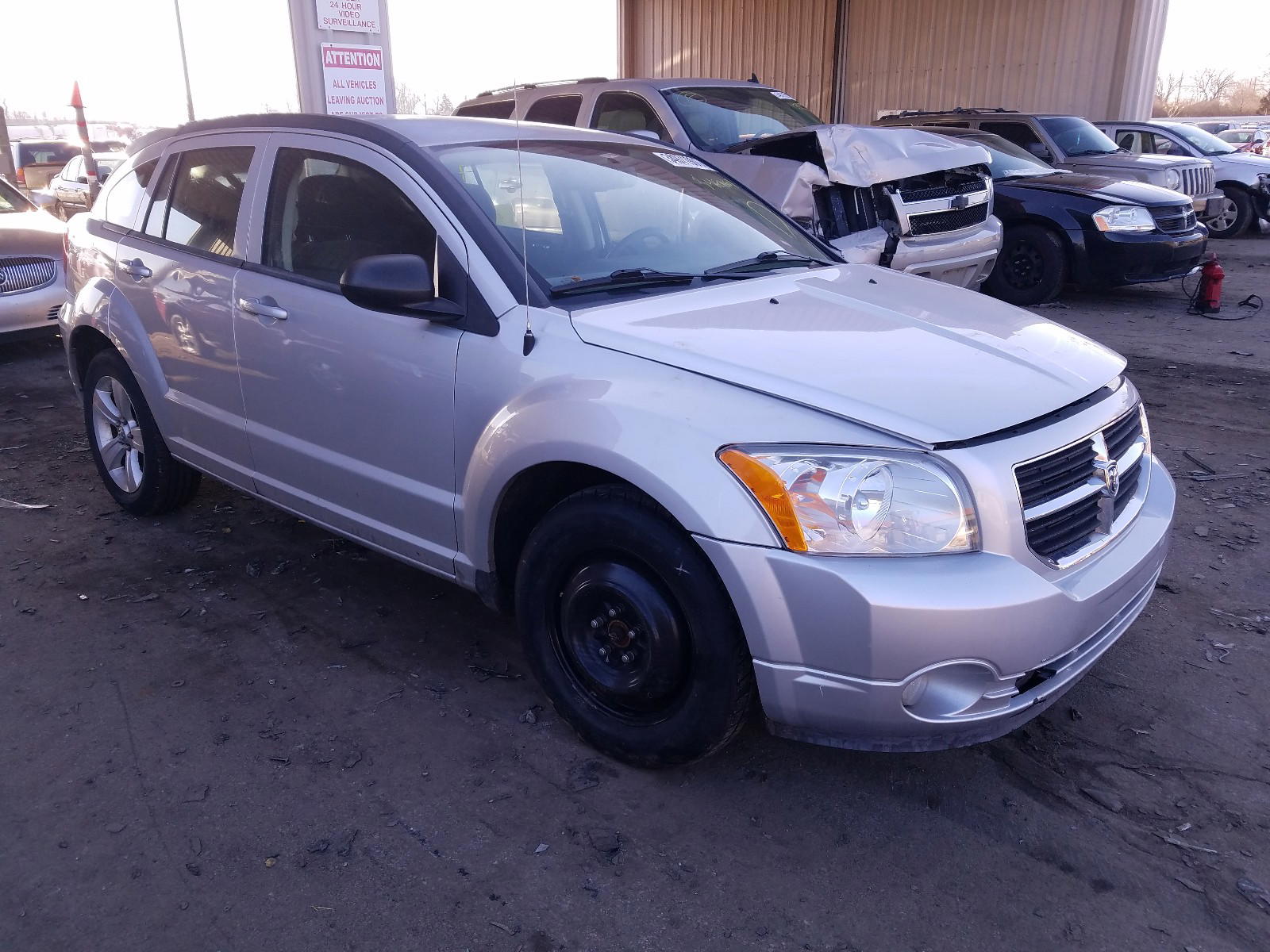 DODGE CALIBER MA 2011 with VIN 1B3CB3HA0BD255234 - Photo from auction