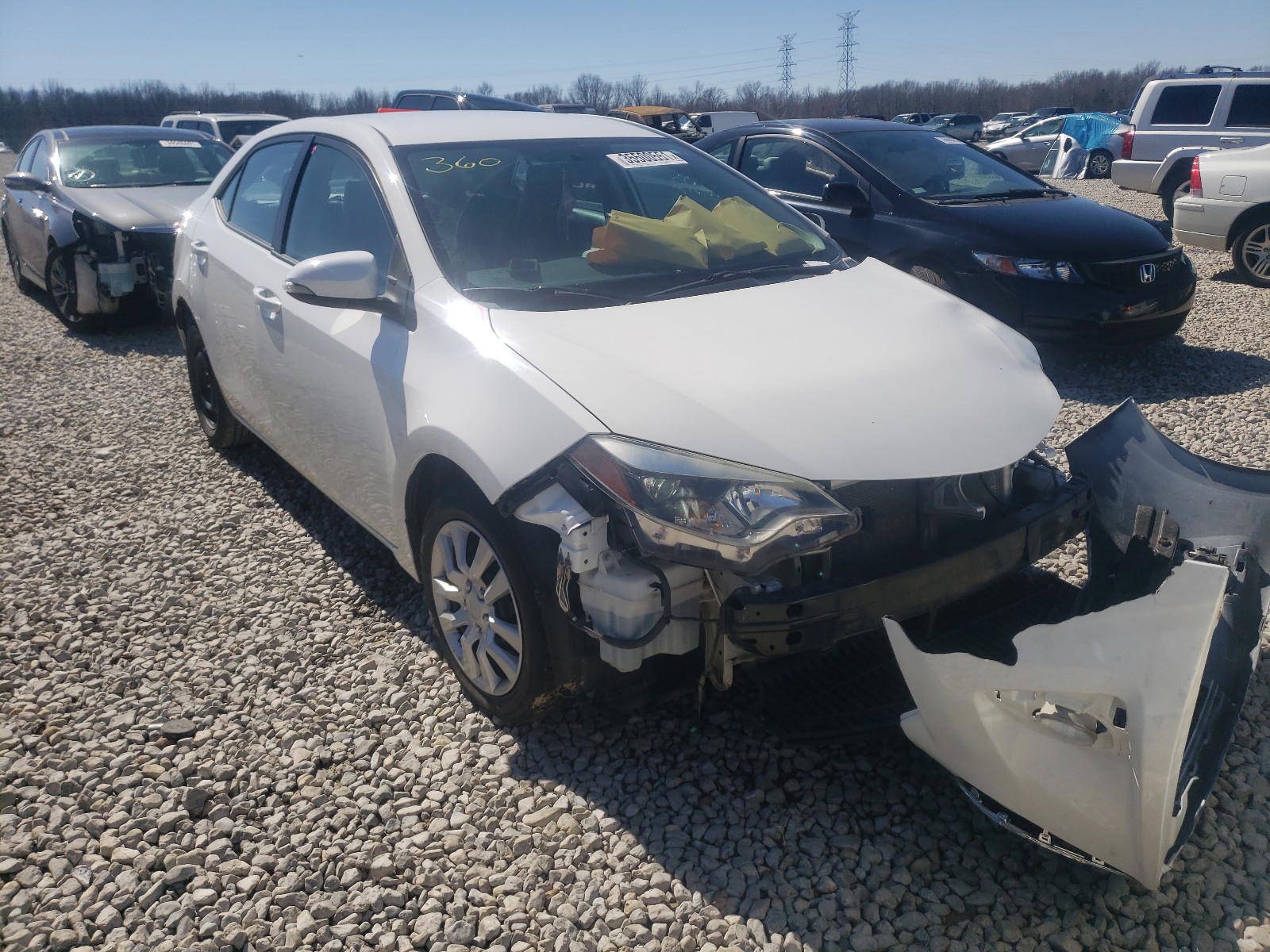 TOYOTA COROLLA L 2015 with VIN 5YFBURHE7FP256491 - Photo from auction