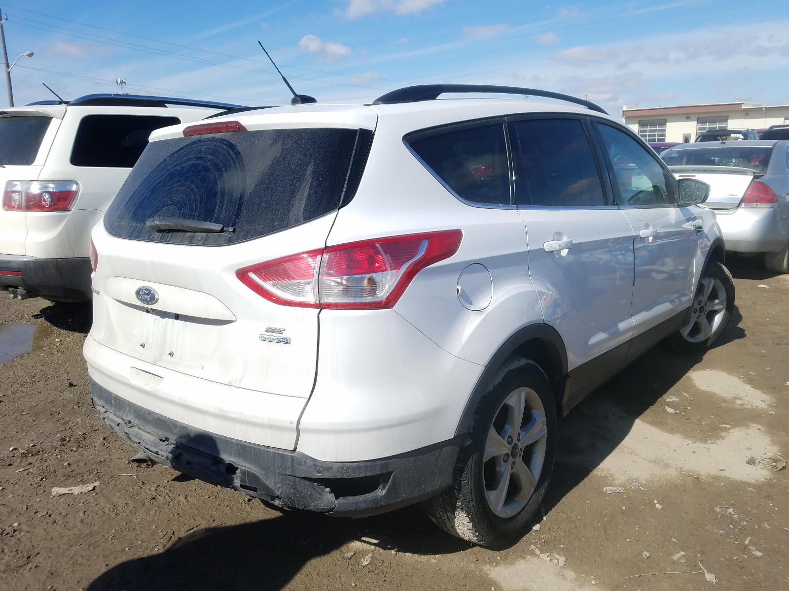 Photo 4 from auction – 2014 FORD ESCAPE SE with VIN 1FMCU9G95EUC53983
