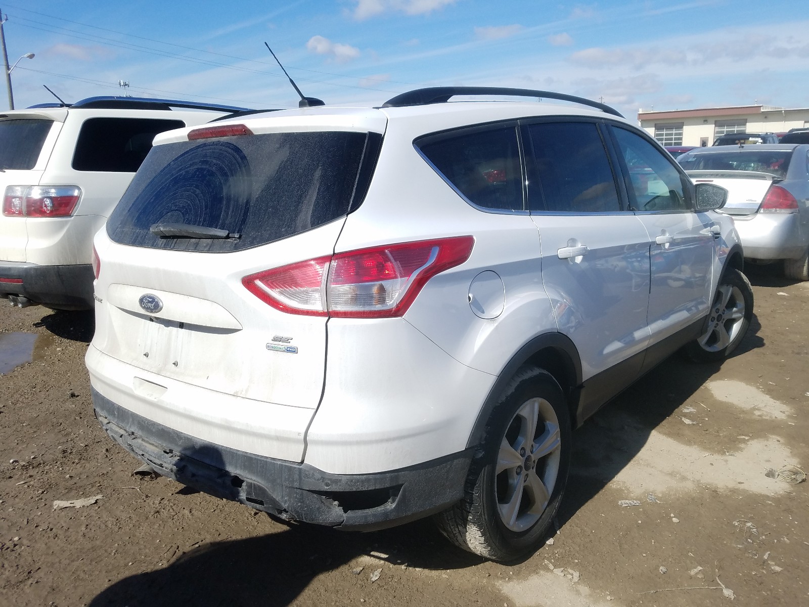 Zdjęcie 4 z aukcji – 2014 FORD ESCAPE SE z VIN 1FMCU9G95EUC53983