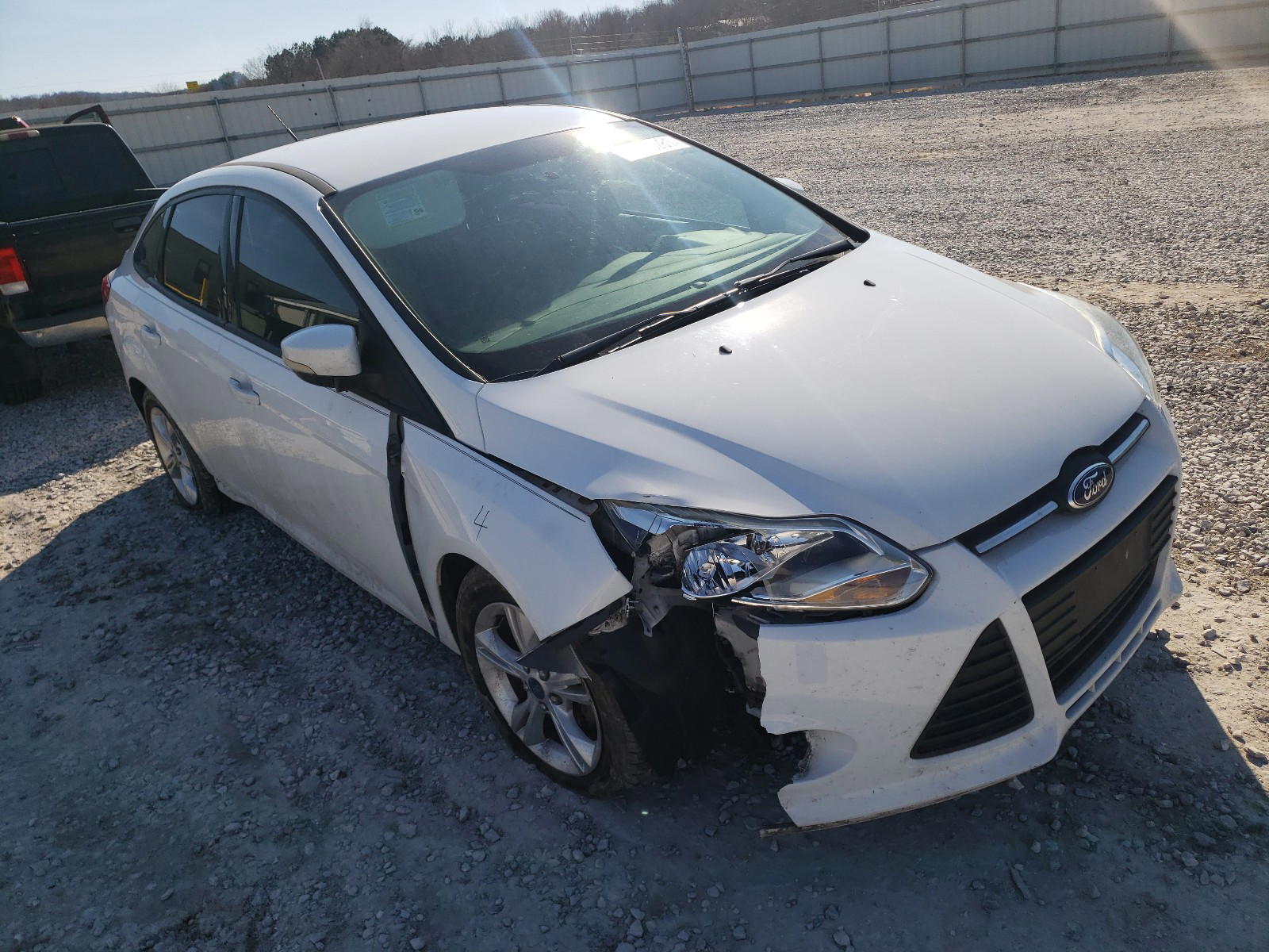 FORD FOCUS SE 2014 with VIN 1FADP3F23EL156018 - Photo from auction