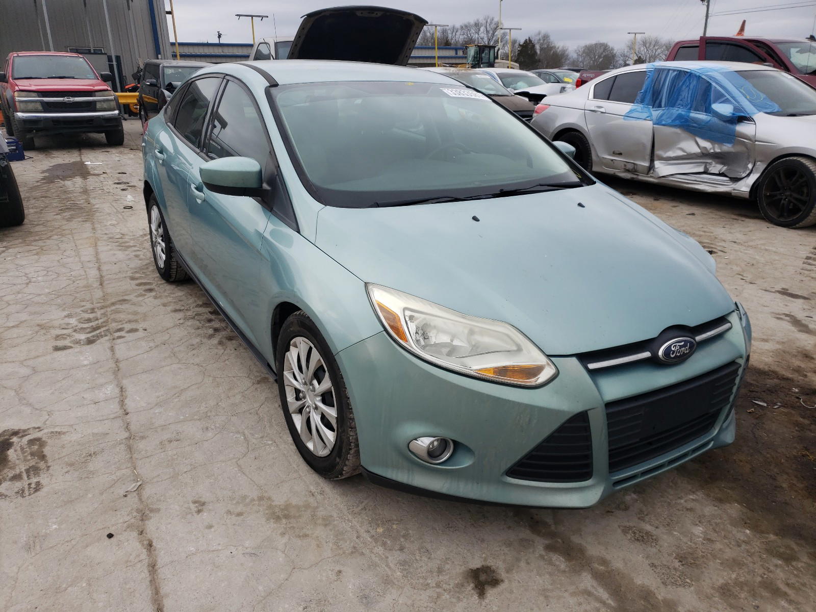 FORD FOCUS SE 2012 with VIN 1FAHP3F23CL413709 - Photo from auction